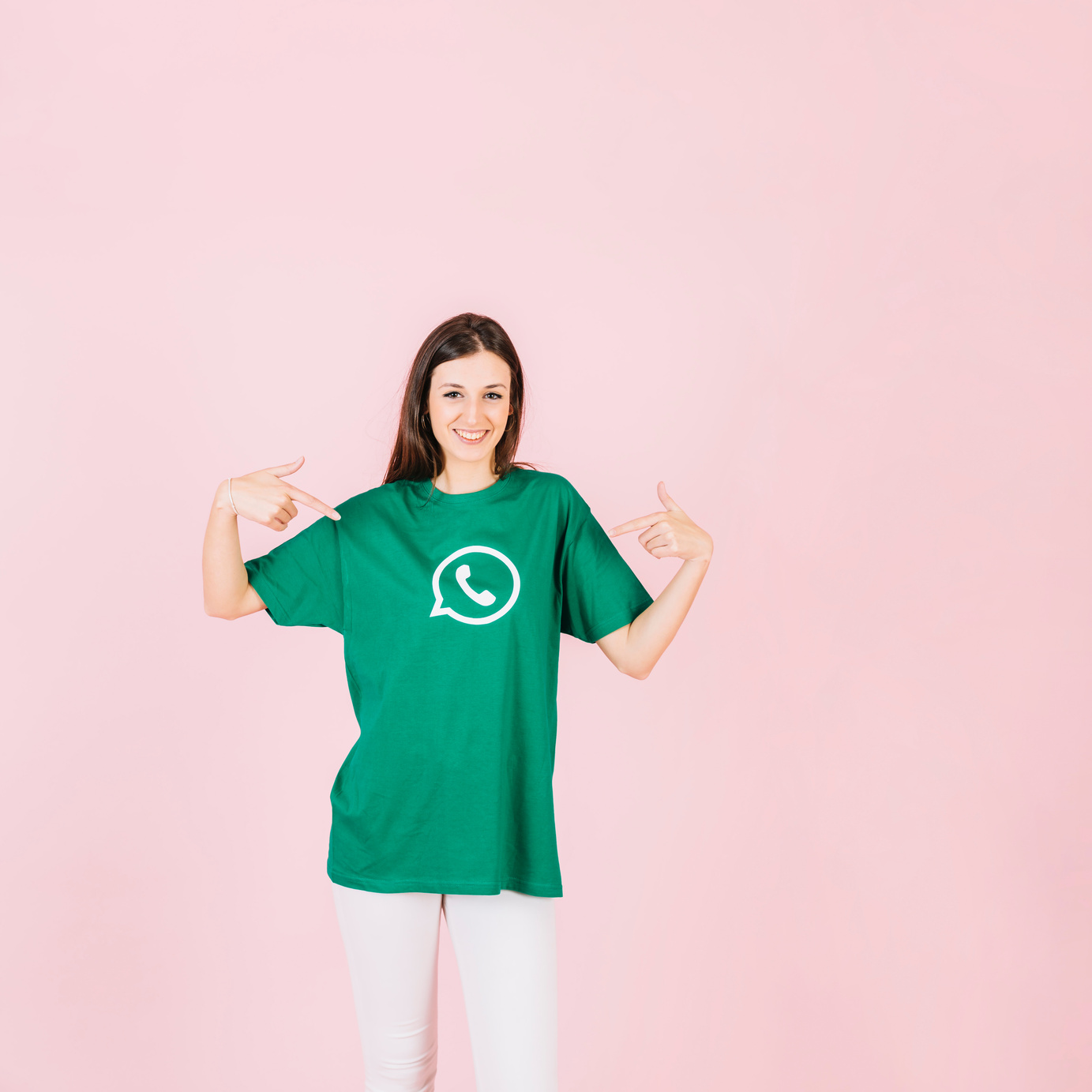 portrait smiling woman pointing her t shirt with whatsapp ic